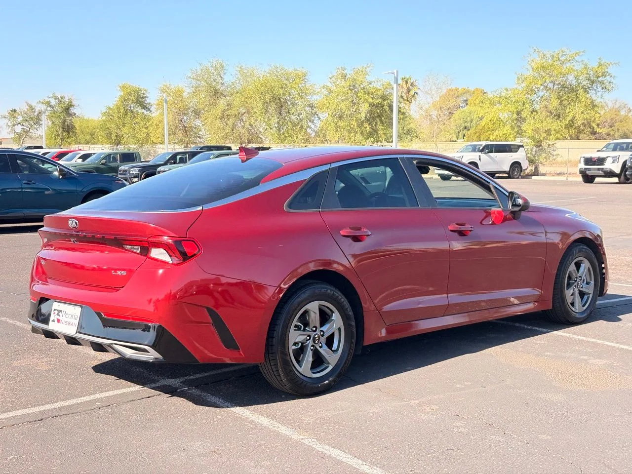 Used 2021 Passion Red Kia LXS image 5