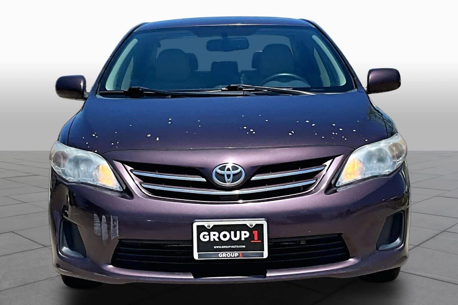 Used 2013 Black Currant Metallic Toyota LE Special Edition image 4