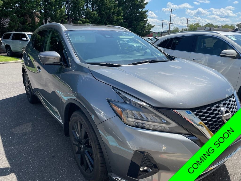 Used 2023 Gun Metallic Nissan Platinum image 1
