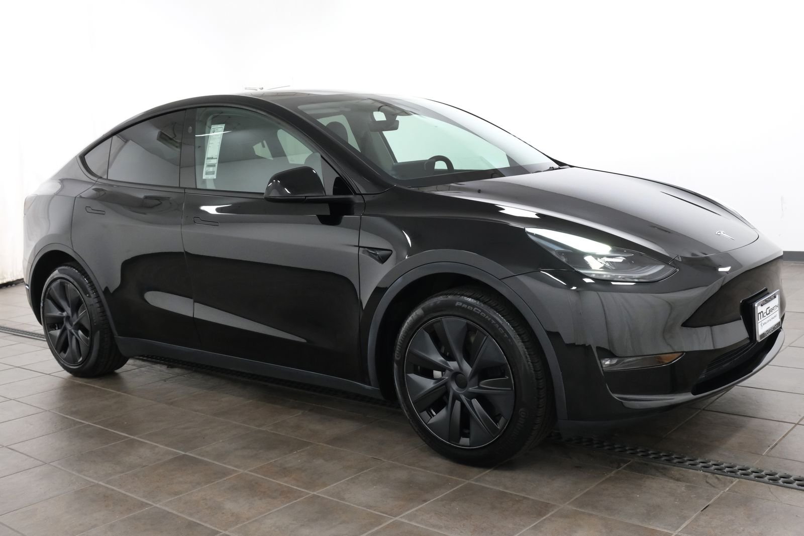Used 2024 Solid Black Tesla Long Range image 8