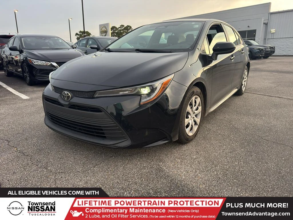 Used 2024 Midnight Black Metallic Toyota LE image 1