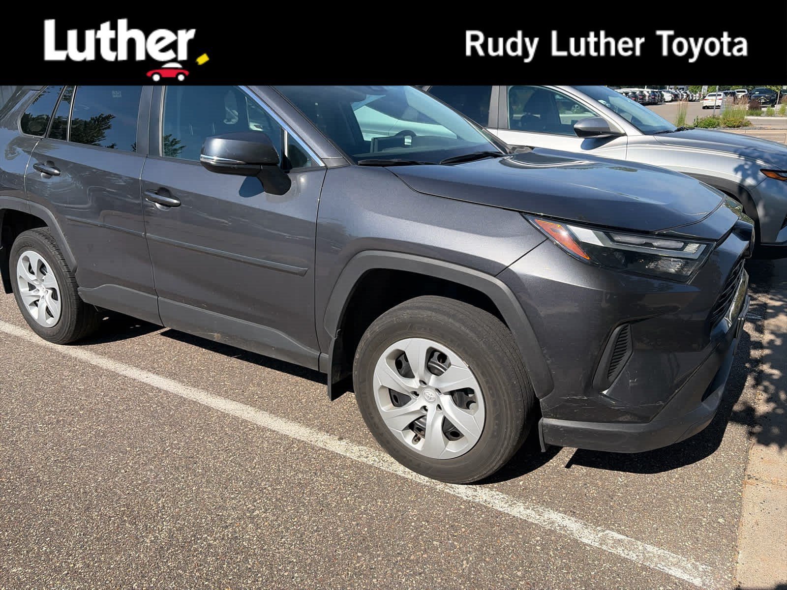 Used 2024 Magnetic Gray Metallic Toyota LE image 1
