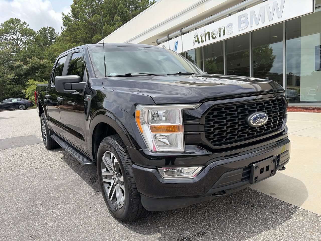 Used 2022 Agate Black Metallic Ford LARIAT image 1