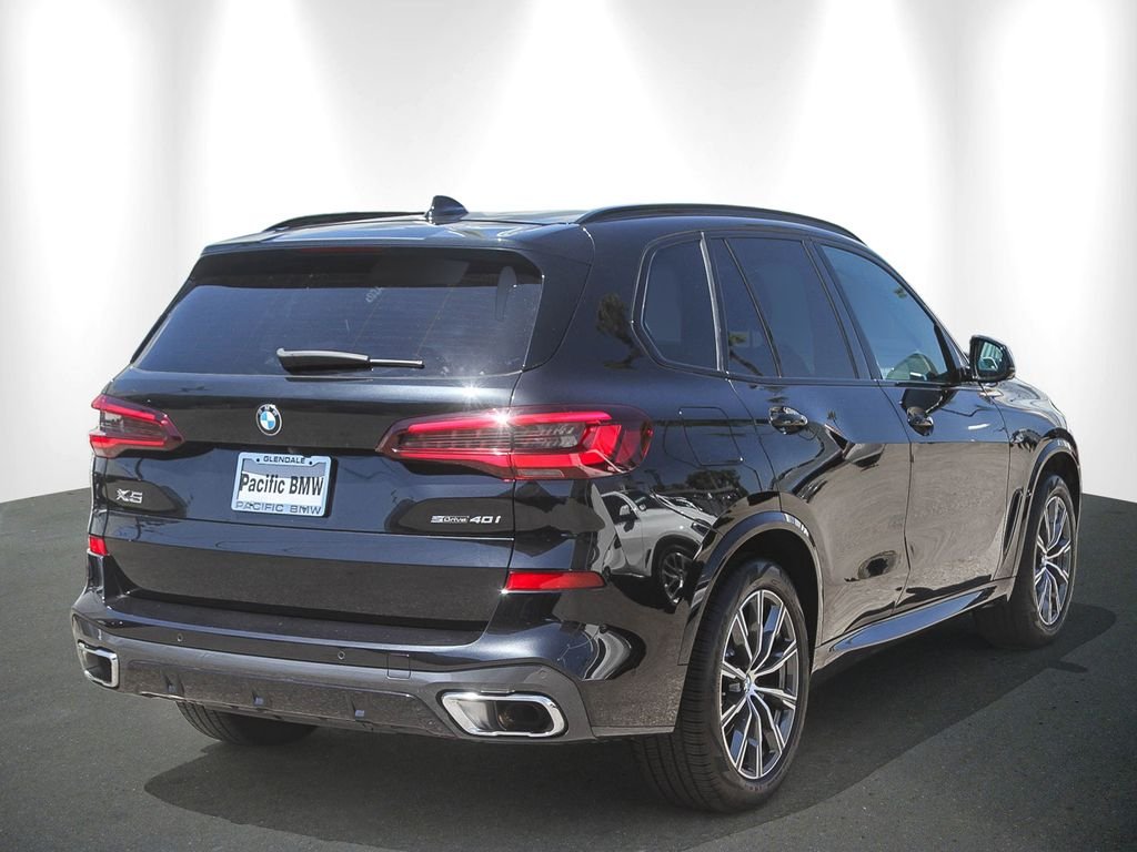 Used 2023 Black Sapphire Metallic BMW sDrive40i image 6