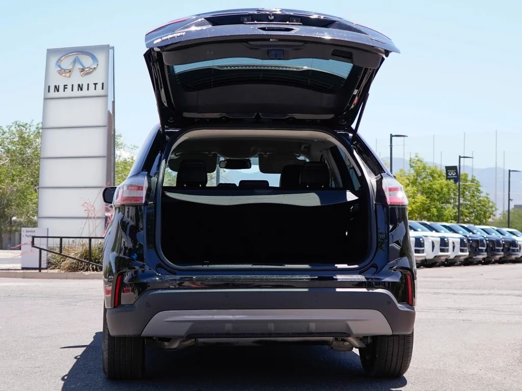 Used 2022 Agate Black Metallic Ford SEL image 7