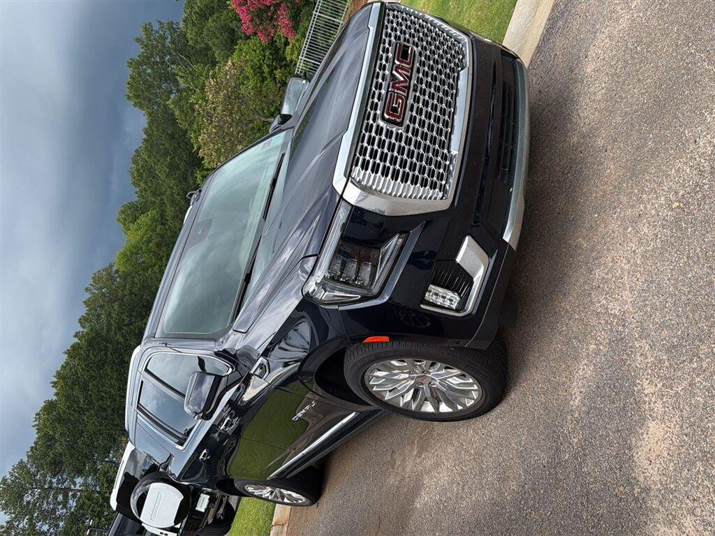 Used 2024 Midnight Blue Metallic GMC Denali image 1