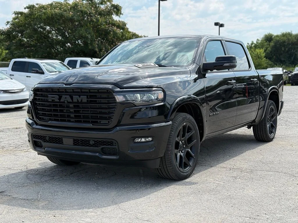 New 2026 Diamond Black Crystal Pearl-Coat Exterior Paint RAM Laramie image 2