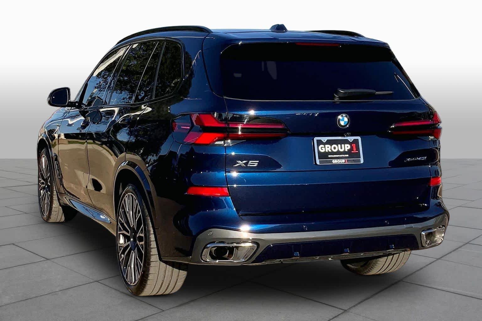 Certified Used 2025 Tanzanite Blue II Metallic BMW xDrive40i image 12