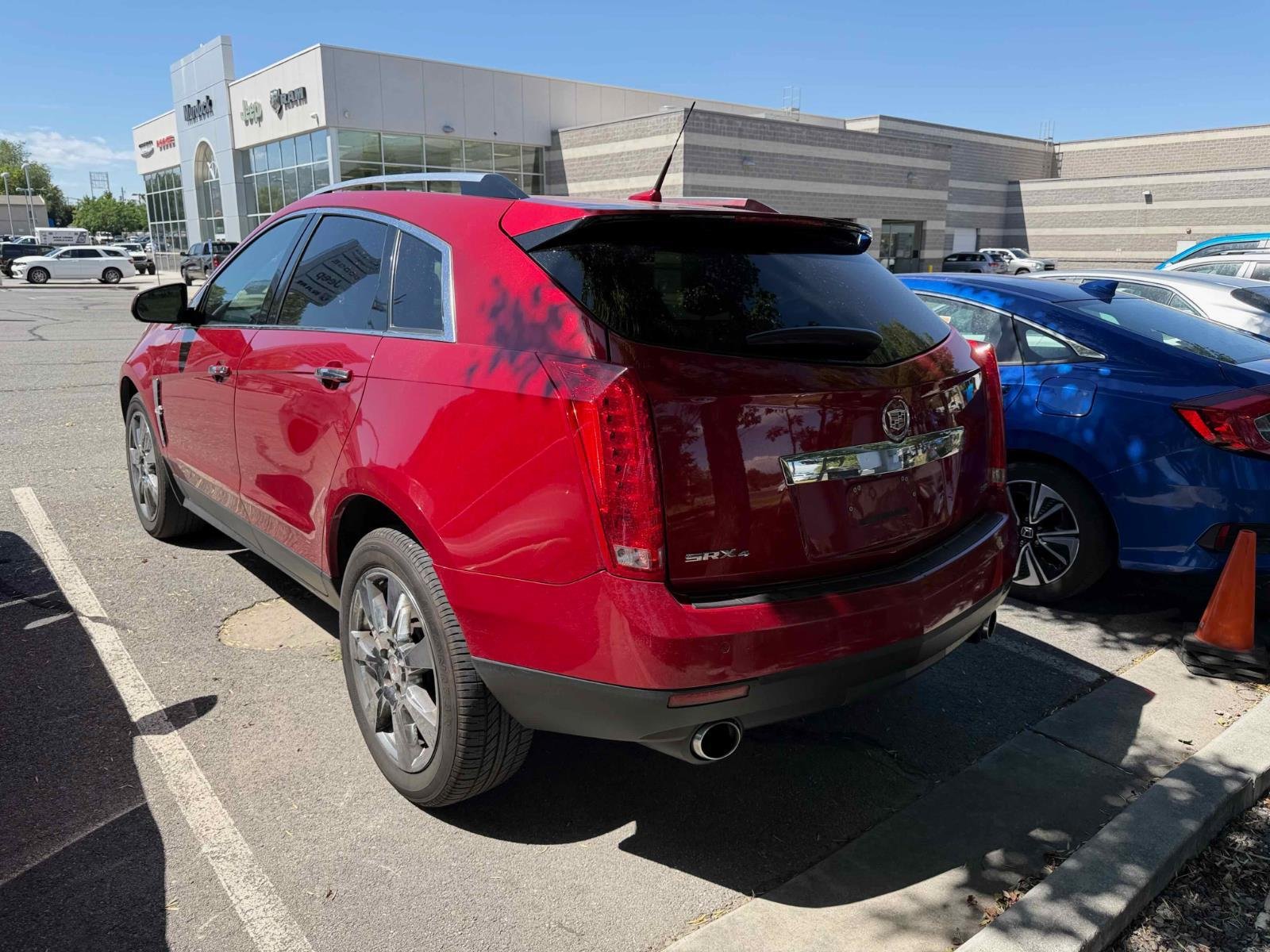 Used 2012 Crystal Red Tintcoat Cadillac Performance Collection image 7