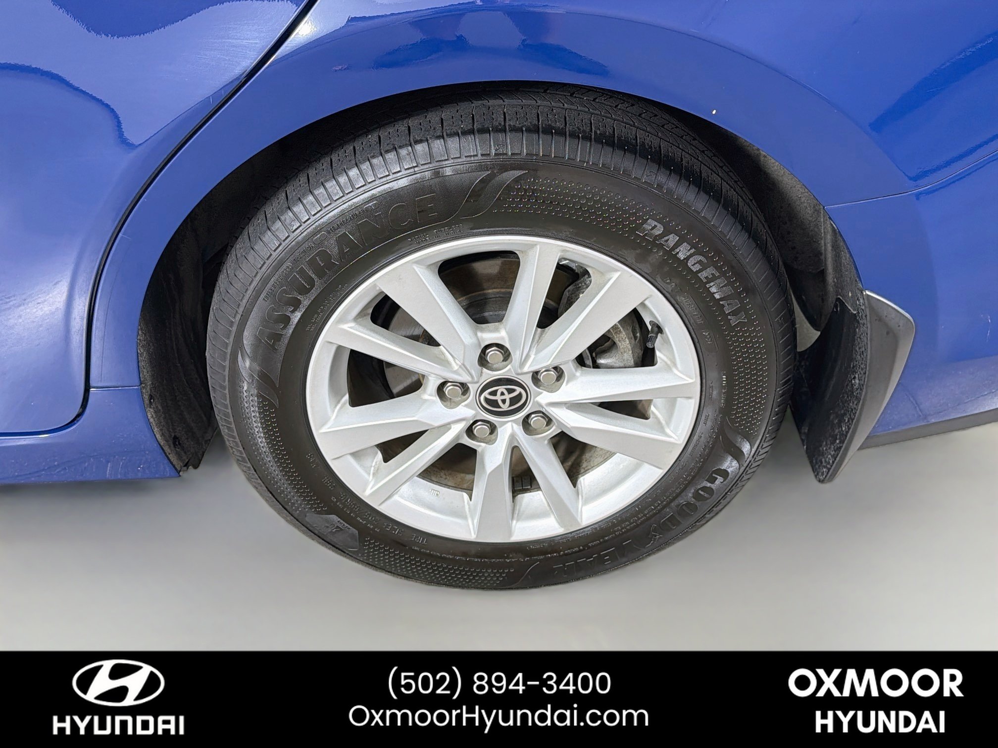 Used 2025 Reservoir Blue Toyota LE image 30