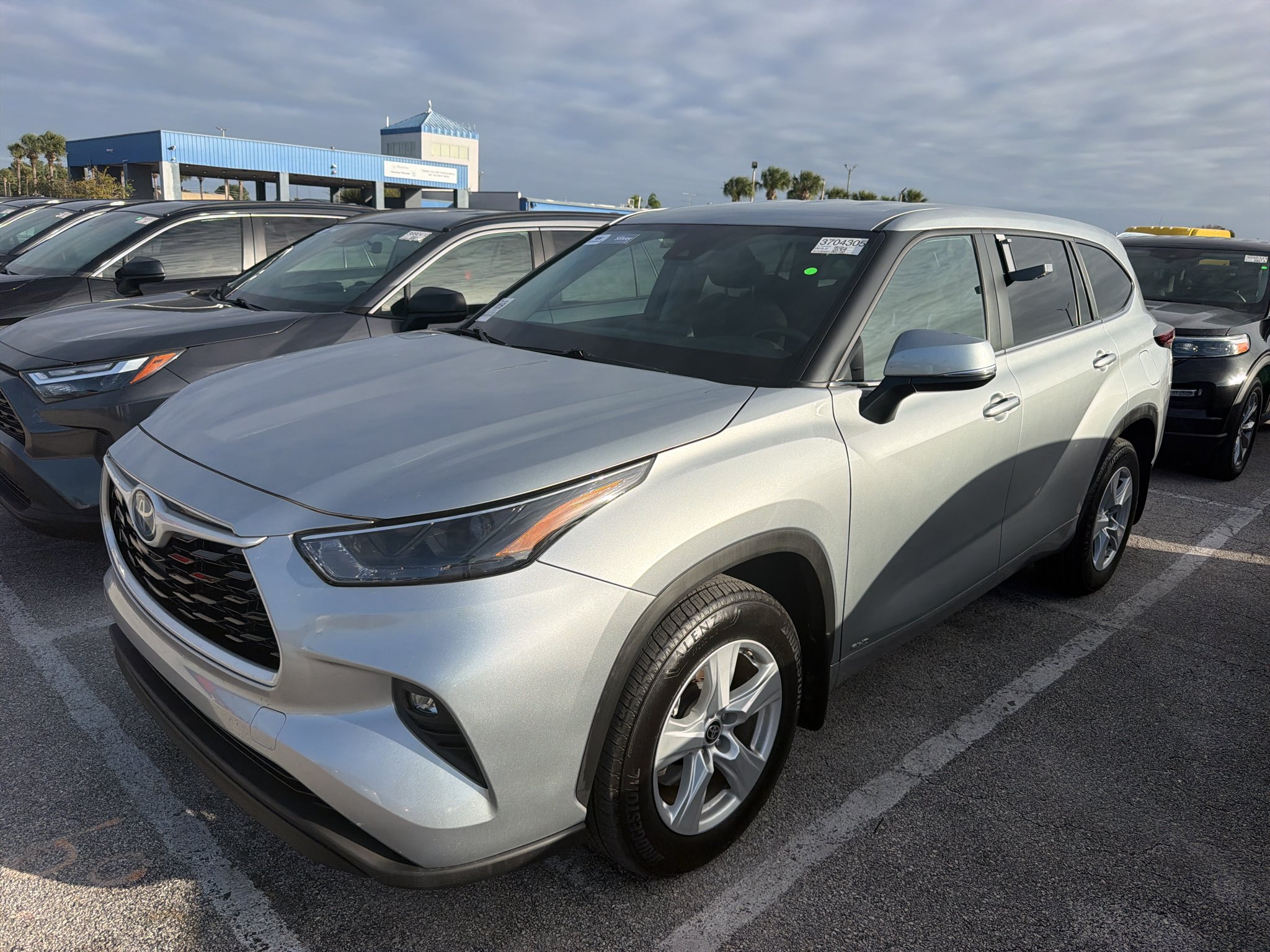 Used 2024 Celestial Silver Metallic Toyota Hybrid LE image 2