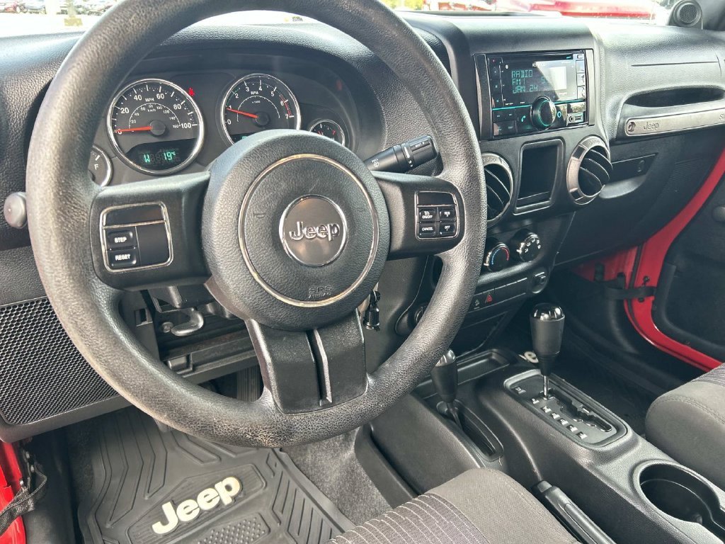 Used 2011 Flame Red Jeep Sport image 13