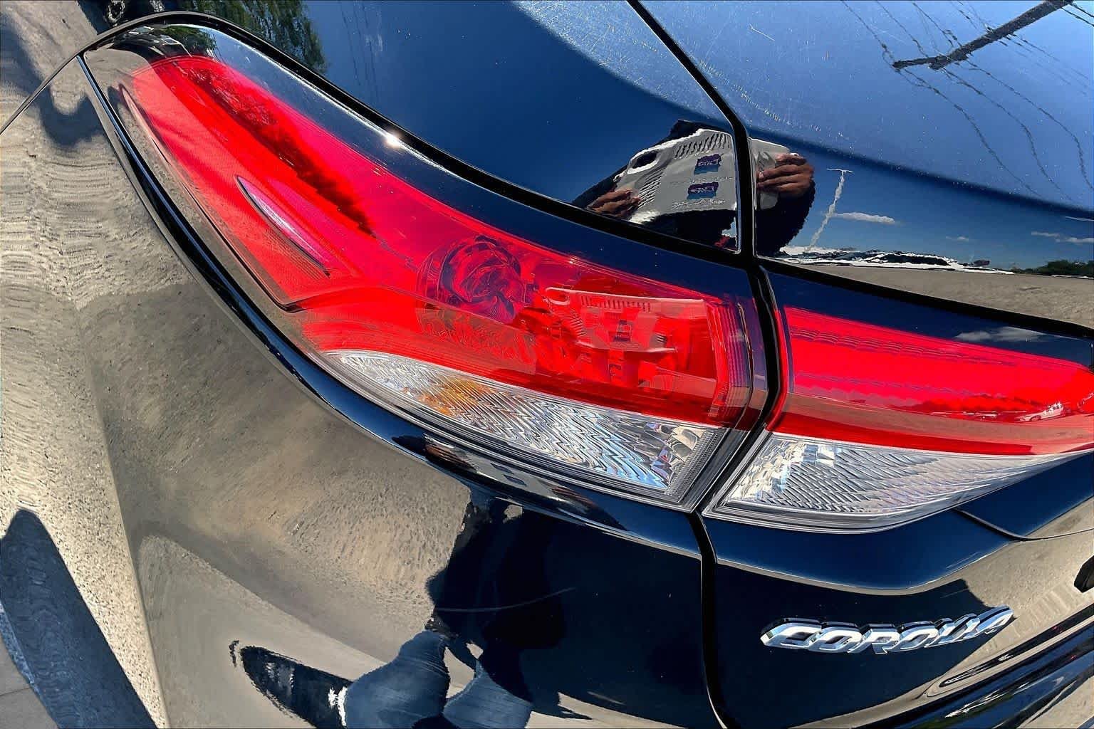 Used 2025 Midnight Black Metallic Toyota LE image 28