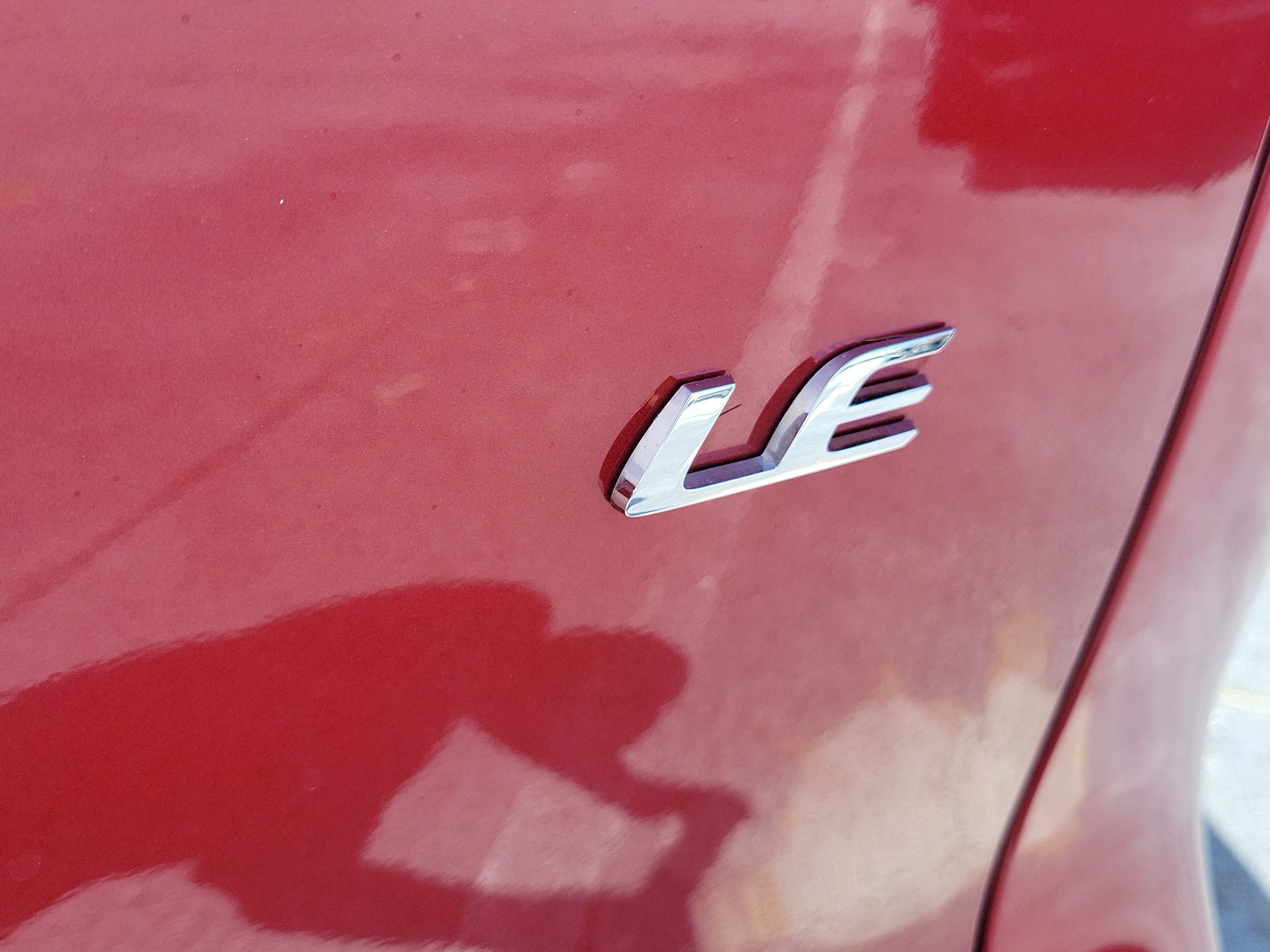 Certified Used 2024 Barcelona Red Metallic Toyota LE image 8