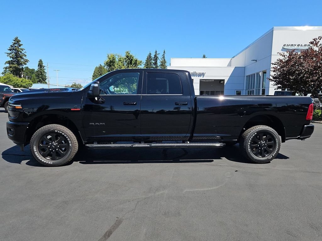 New 2026 Diamond Black Crystal Pearl-Coat Exterior Paint RAM Laramie image 3