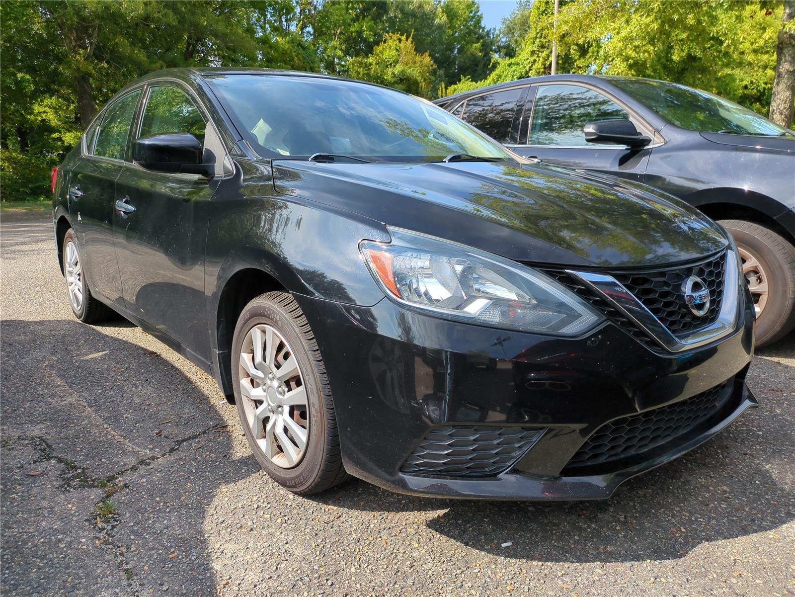 Used 2019 Super Black Nissan S image 1