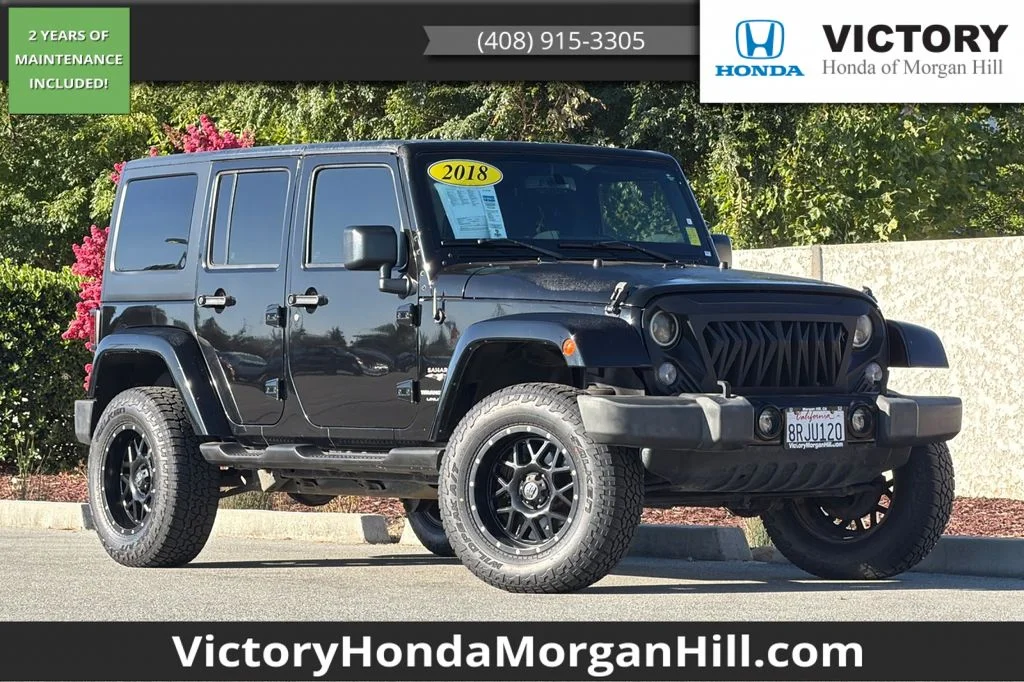 Used 2018 Black Clearcoat Jeep Unlimited Sahara image 1