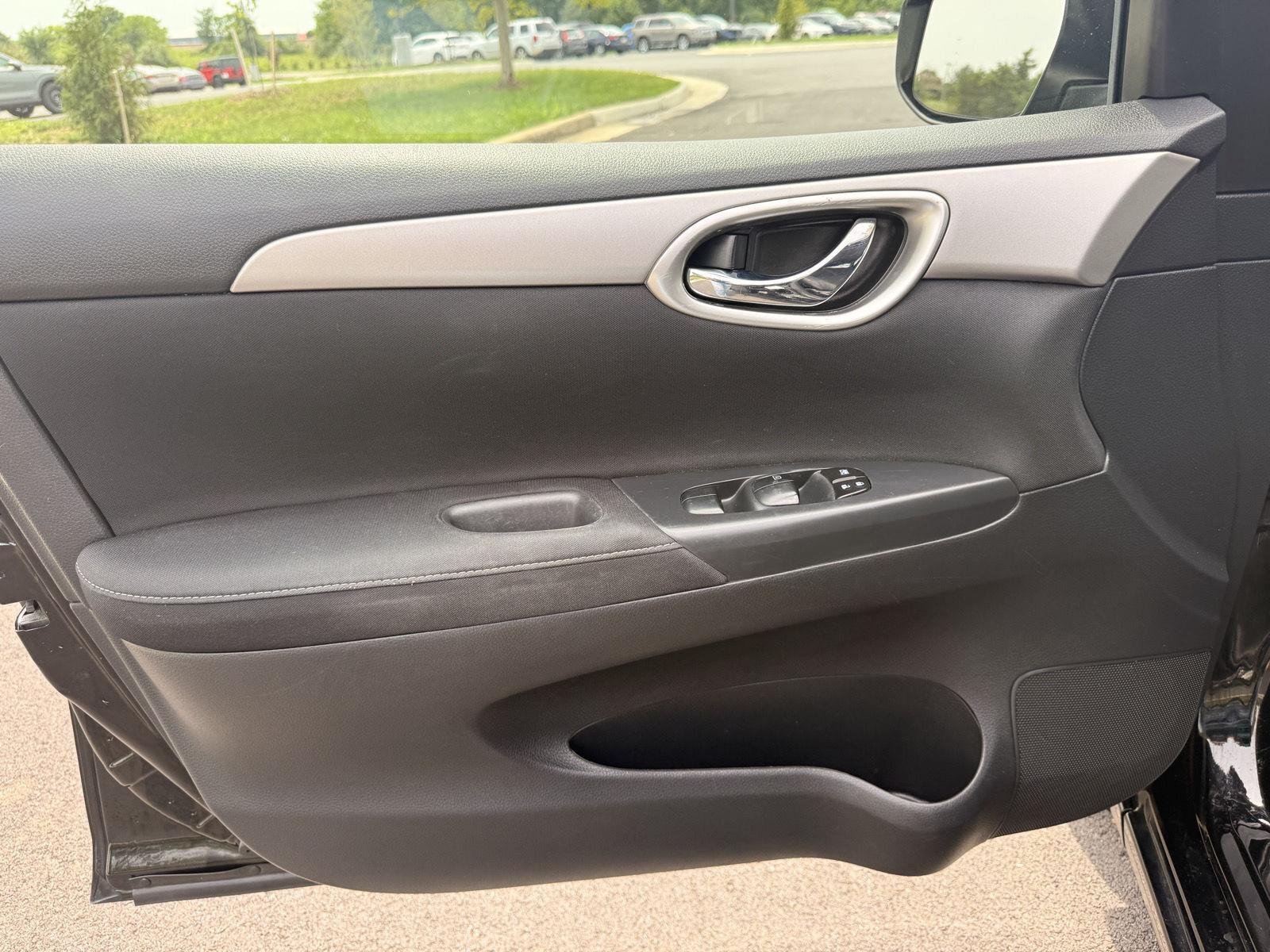 Used 2015 Super Black Nissan S image 12