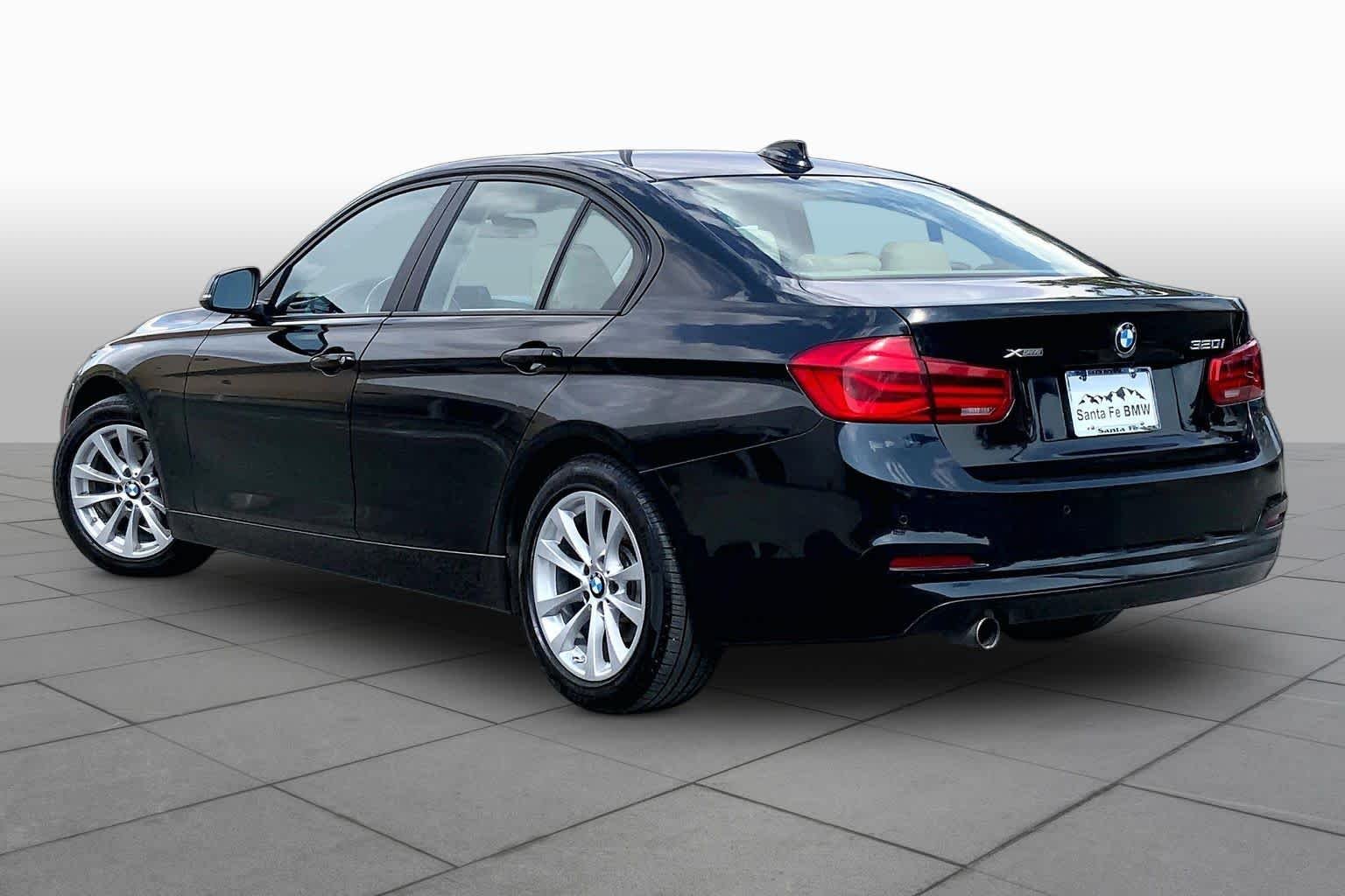 Used 2016 Black Sapphire Metallic BMW 320i xDrive image 11