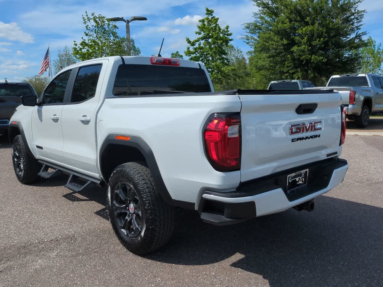 Used 2024 Summit White GMC 2WD Elevation image 4