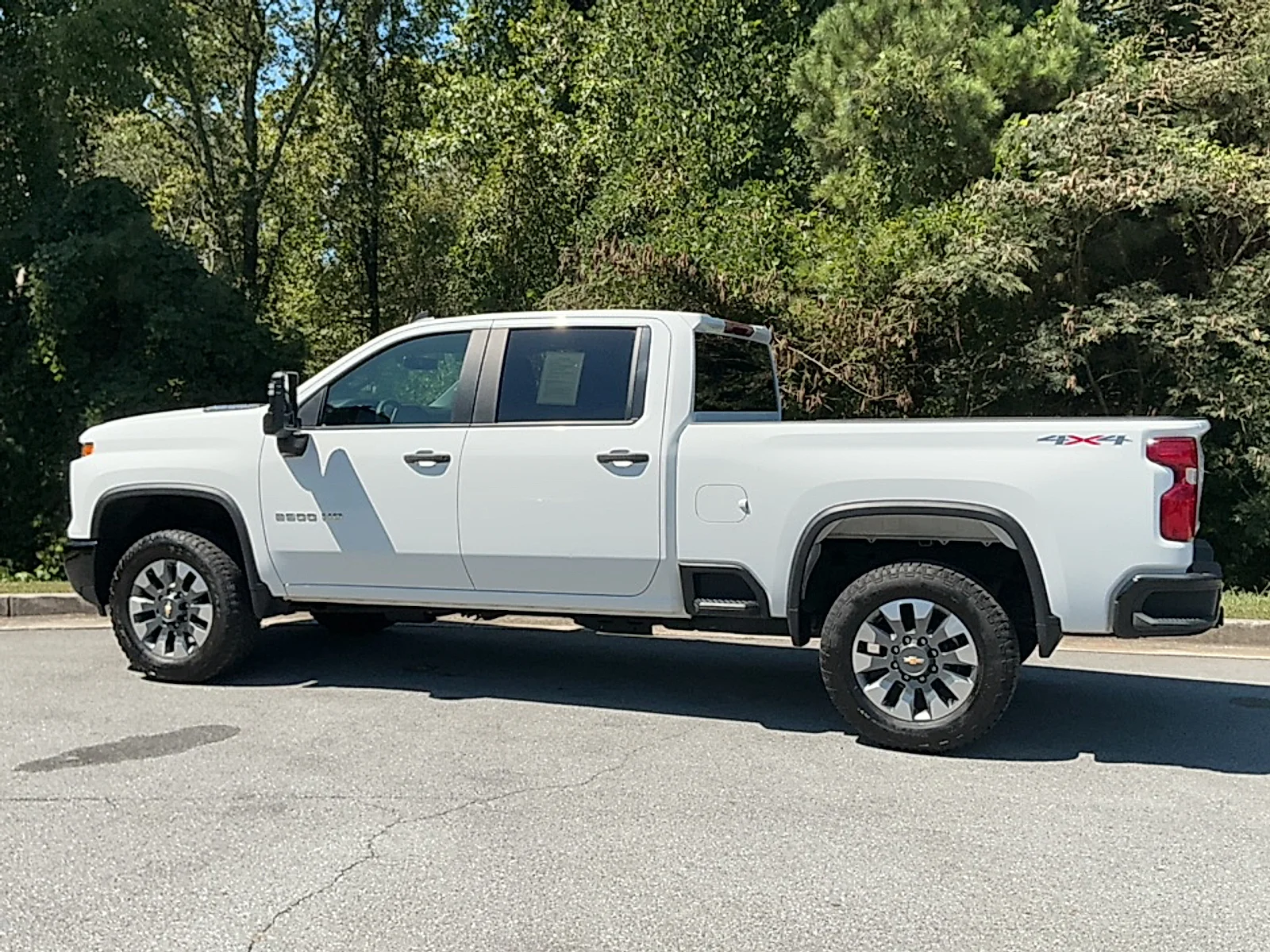 Used 2024 Summit White Chevrolet 4WD Crew Cab Standard Bed Custom image 3