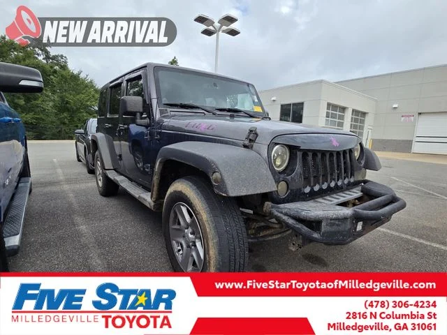 Used 2014 Gray Jeep Unlimited Sport image 1