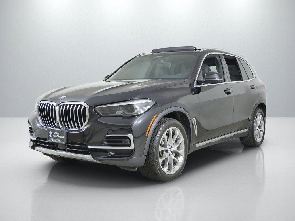Used 2022 Black Sapphire Metallic BMW xDrive40i image 1