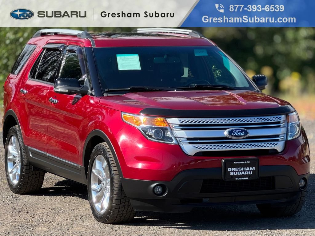 Used 2014 Ruby Red Metallic Ford XLT image 1
