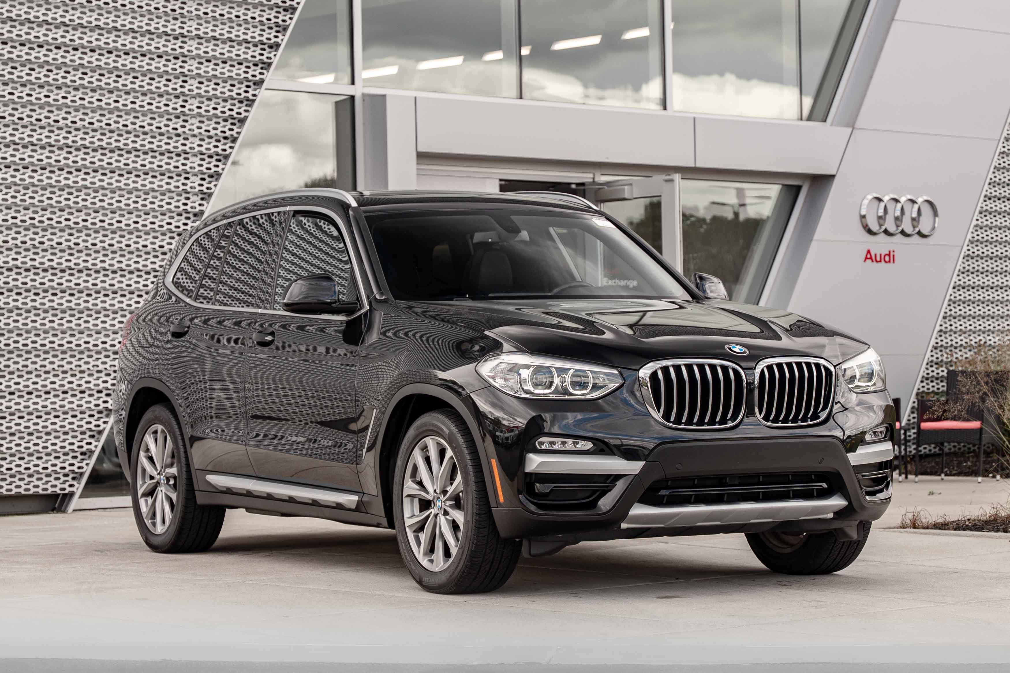 Used 2018 Black Sapphire Metallic BMW xDrive30i image 1