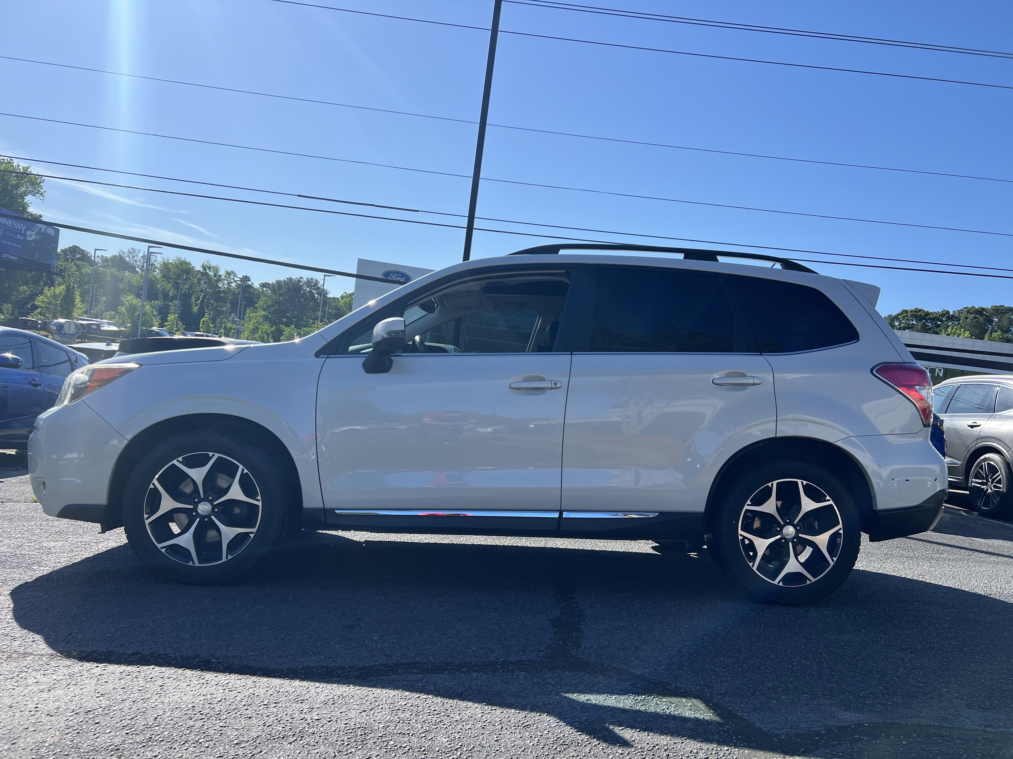 Used 2015 Subaru Forester XT Touring with VIN JF2SJGUCXFH404566 for sale in Chamblee, GA