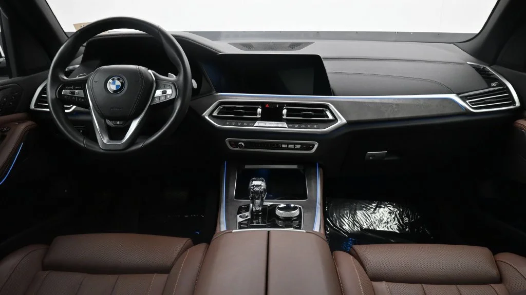 Used 2023 Mineral White Metallic BMW xDrive45e image 4