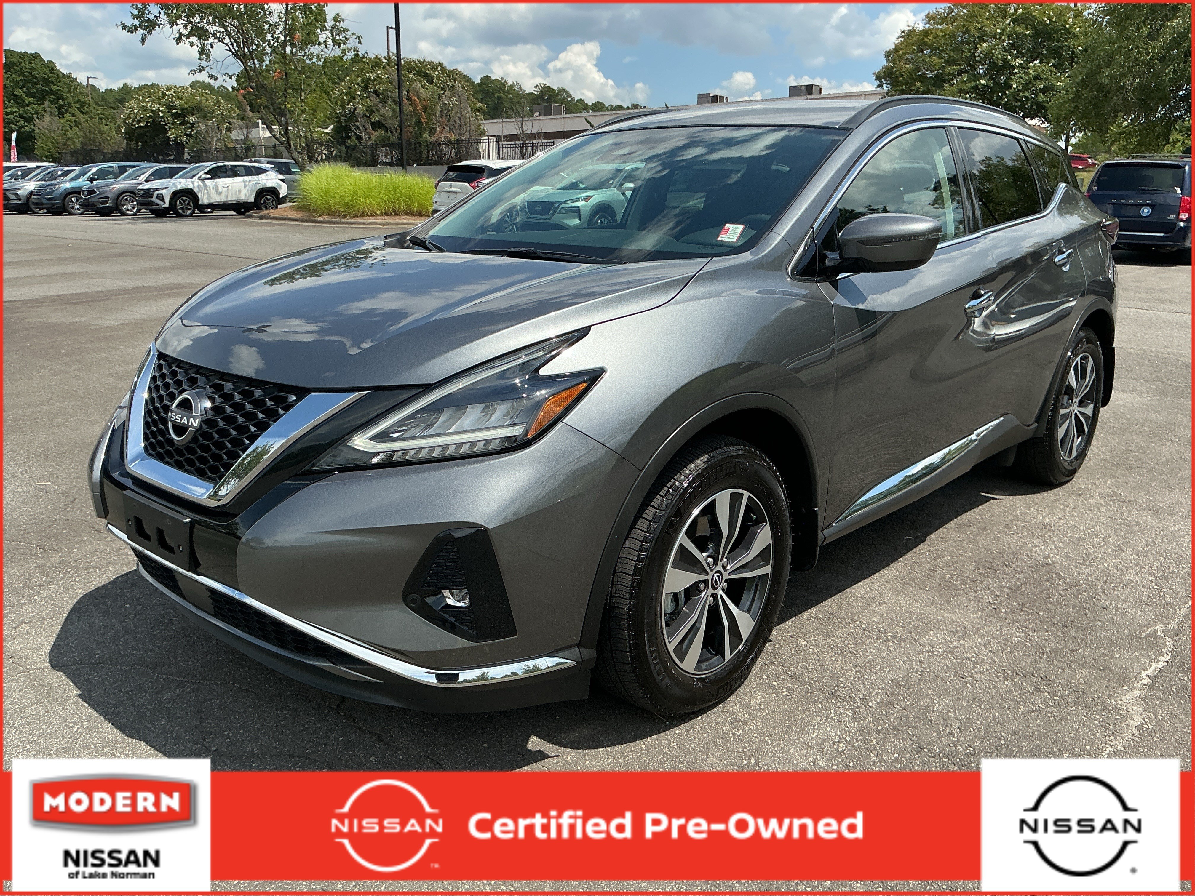 Used 2024 Gun Metallic Nissan SV image 1