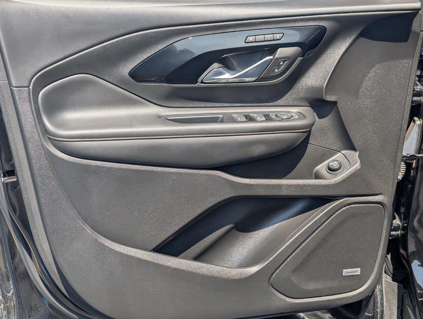 Used 2023 EBONY TWILIGHT METALLIC GMC AT4 image 12