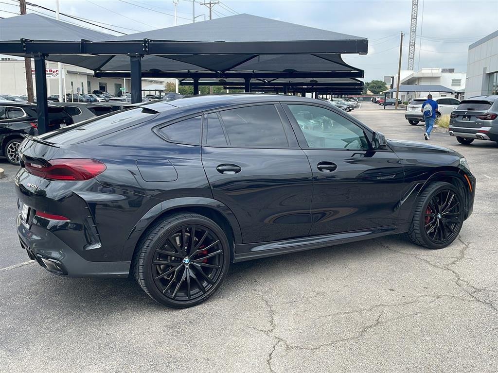 Certified Used 2023 Black Sapphire Metallic BMW M50i image 2