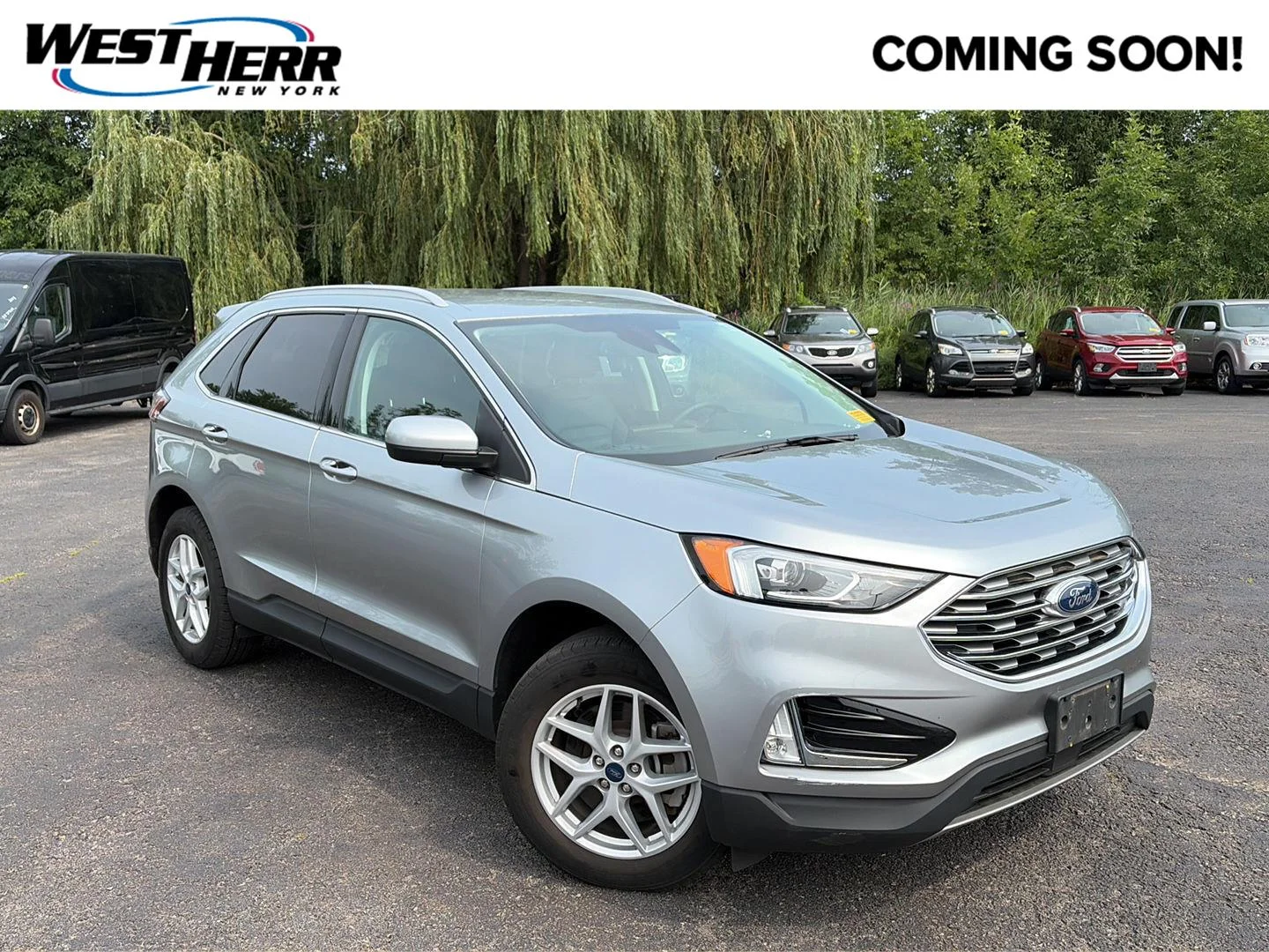 Used 2021 Iconic Silver Ford SEL image 1