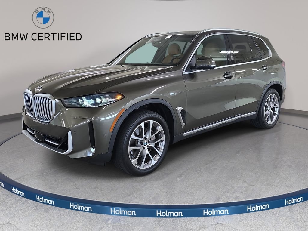 Certified Used 2024 Manhattan Green Metallic BMW sDrive40i image 1