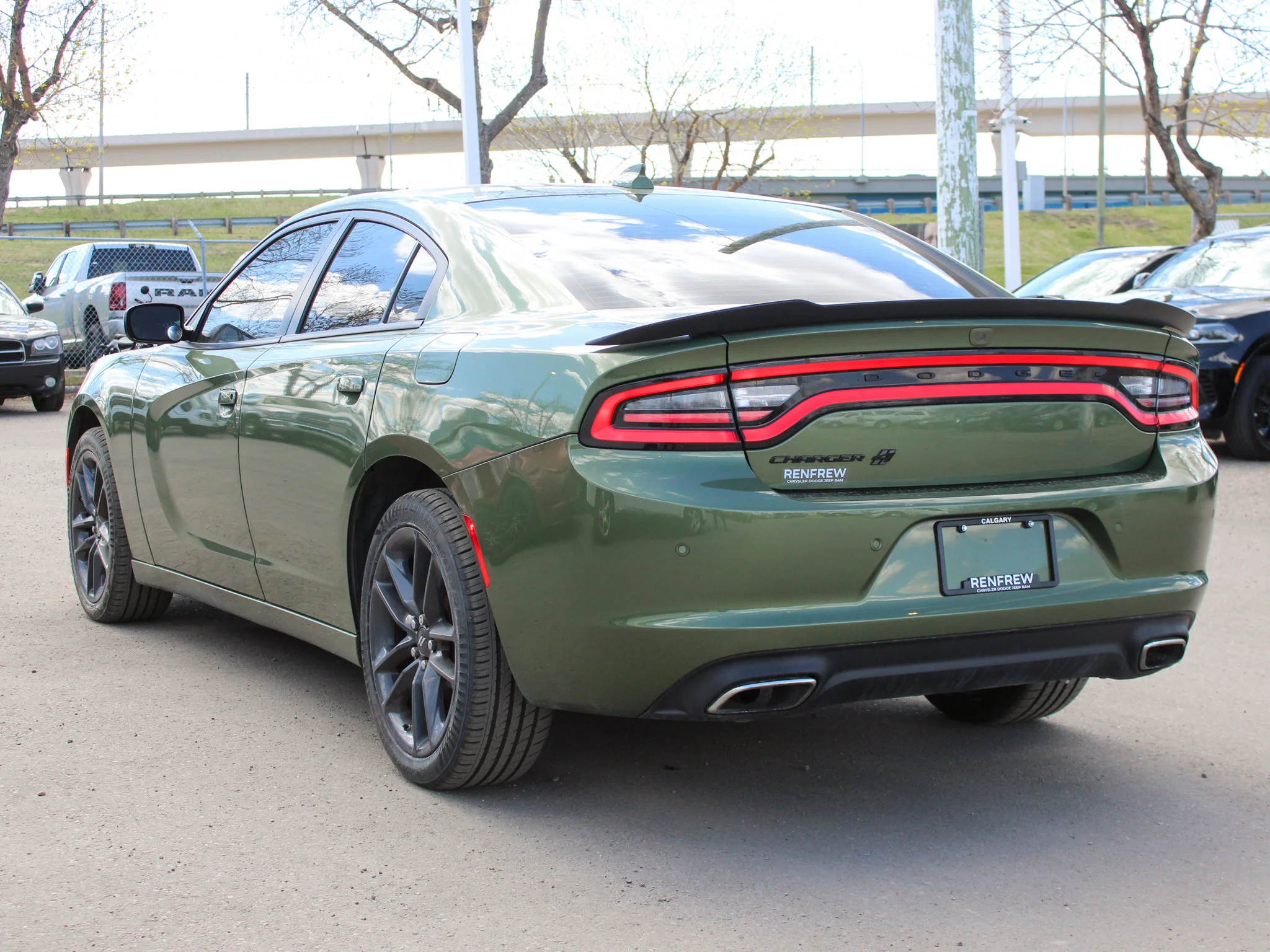 Certified Used 2021 Green Dodge SXT * 300HP V6 | Blacktop Package | Heated Seats | Navigation | F8 Green Metallic image 12