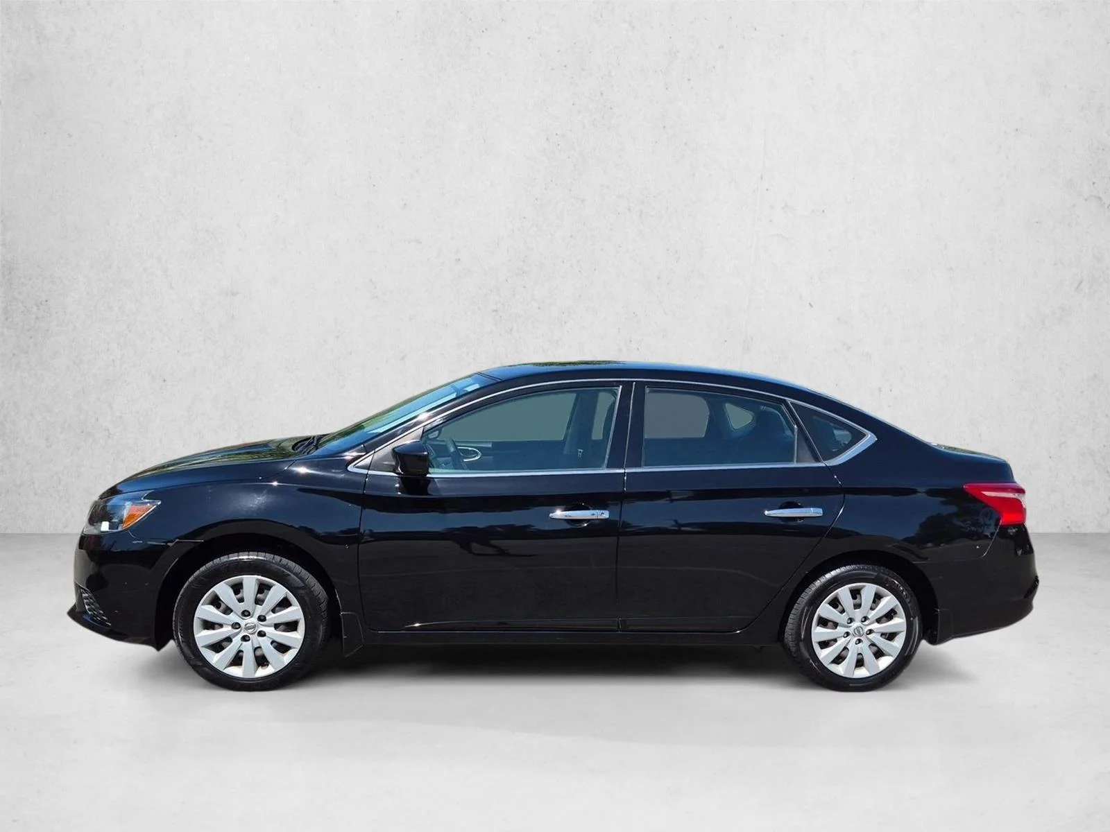 Used 2017 Super Black Nissan SV image 9