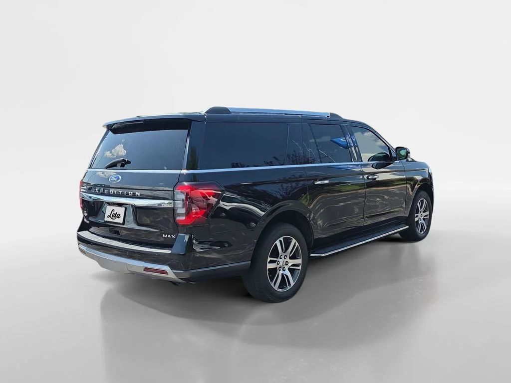 Used 2022 Black Metallic Ford Limited image 4