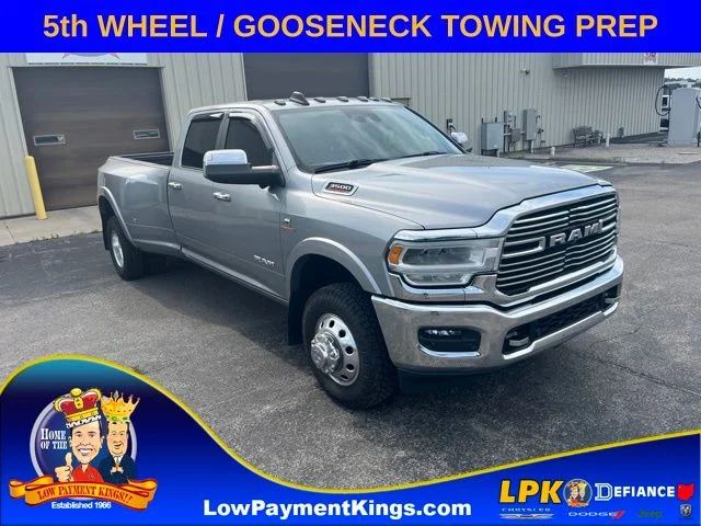 Used 2021 Billet Silver Metallic Ram Laramie image 1