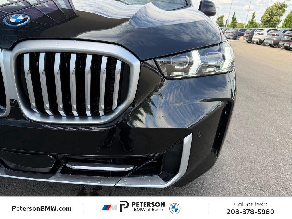New 2026 Black Sapphire Metallic BMW xDrive50e image 40