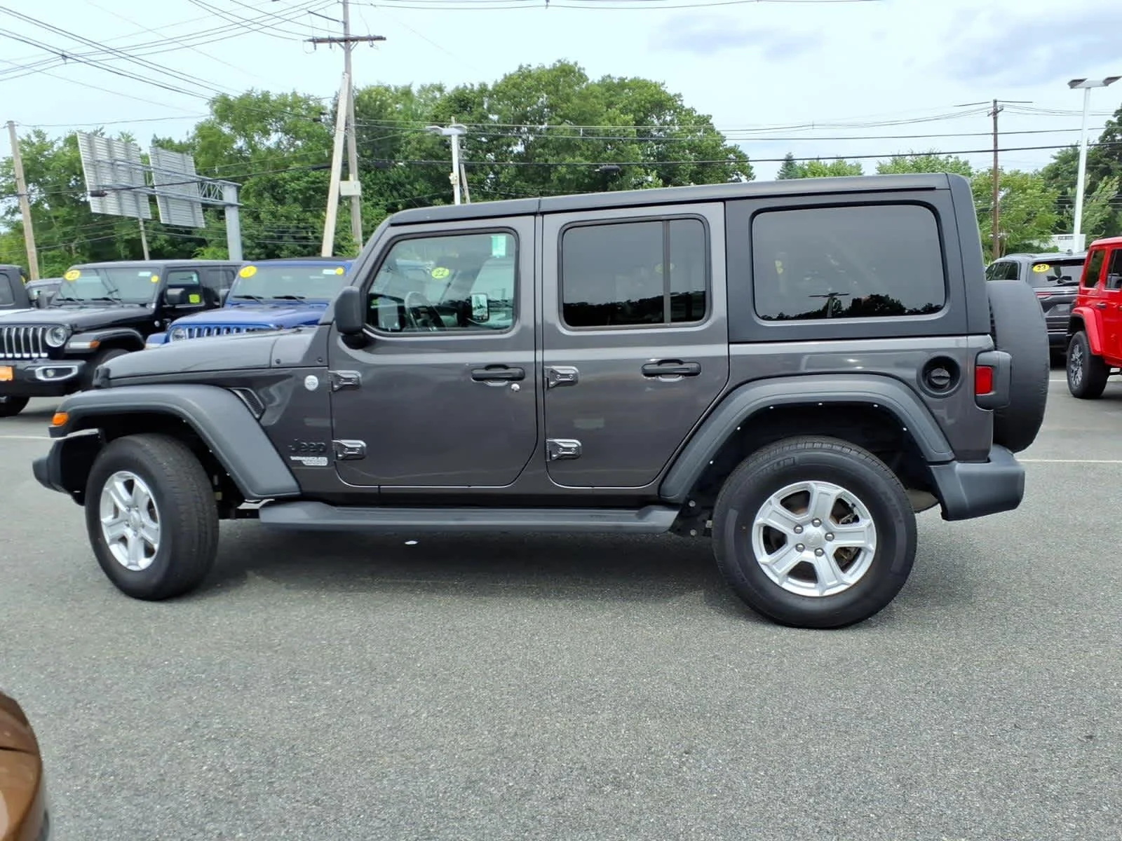 Certified Used 2021 Granite Crystal Metallic Clearcoat Jeep Unlimited Sport S image 12