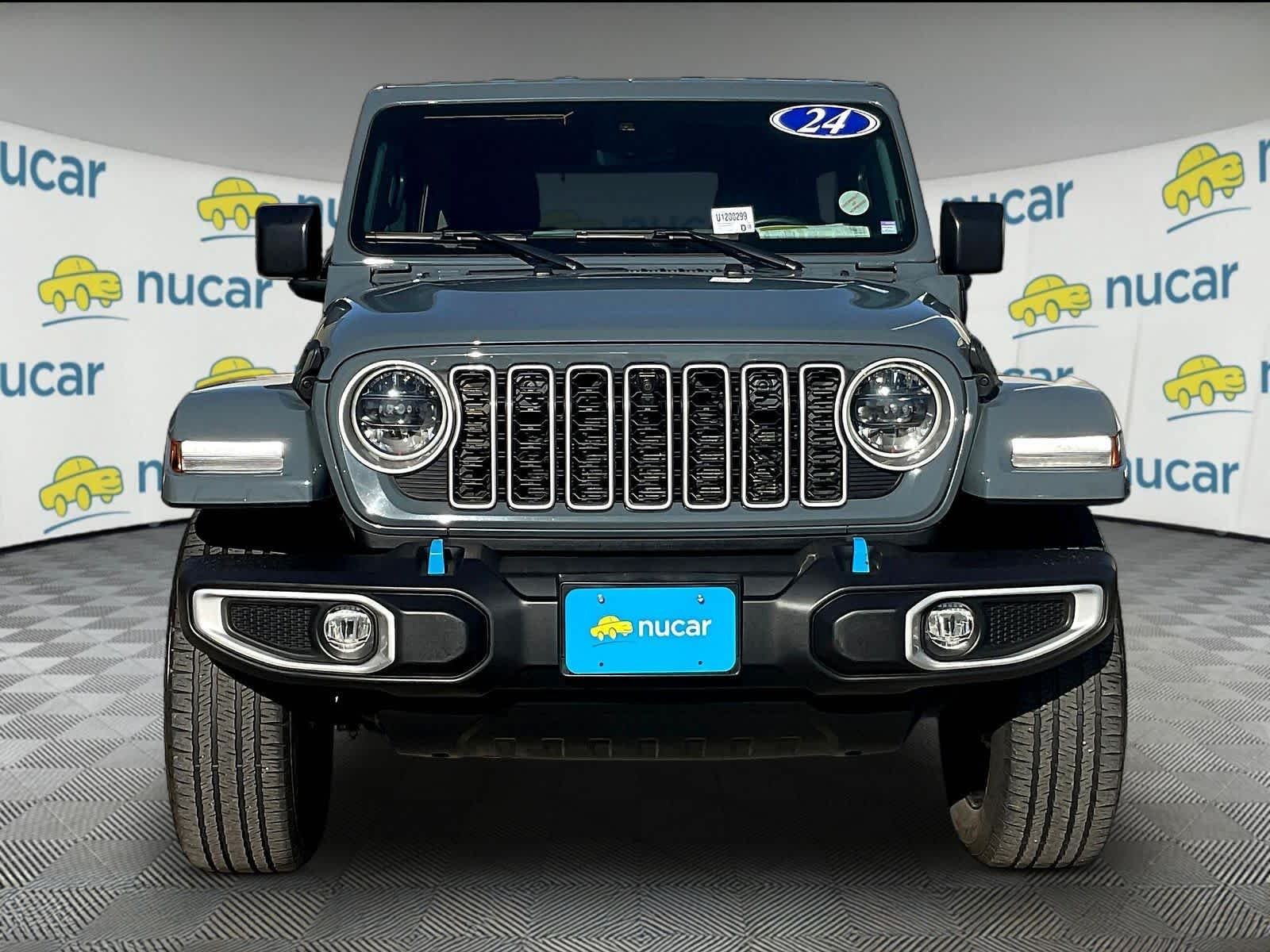 Used 2024 Jeep Wrangler 4xe Sahara 4XE with VIN 1C4RJXP64RW145446 for sale in Saint Albans City, VT