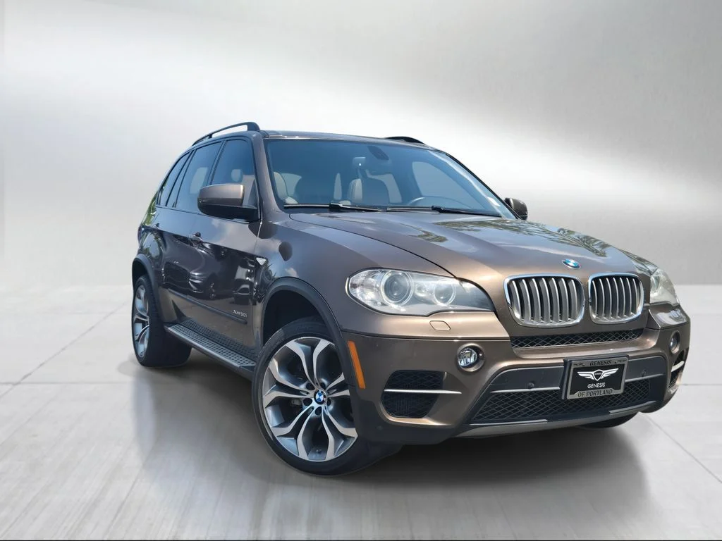 Used 2013 Bronze Metallic BMW xDrive50i image 1