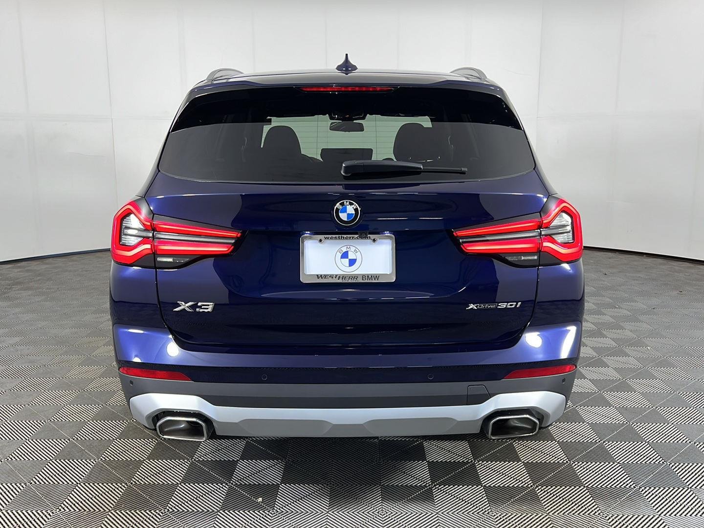 Certified Used 2024 Tanzanite Blue II Metallic BMW xDrive30i image 6