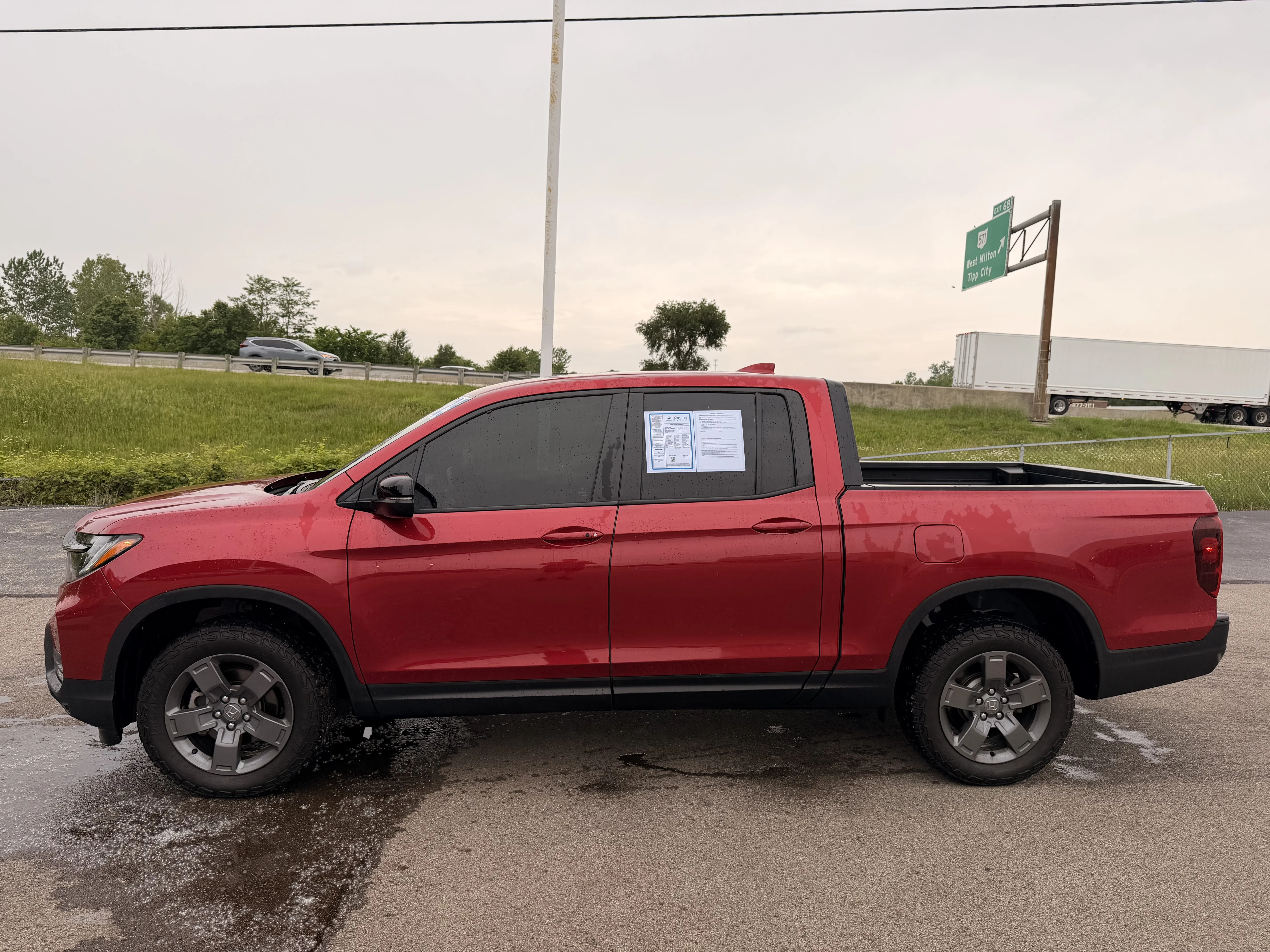 Certified Used 2025 Radiant Red Metallic II Honda TrailSport image 6