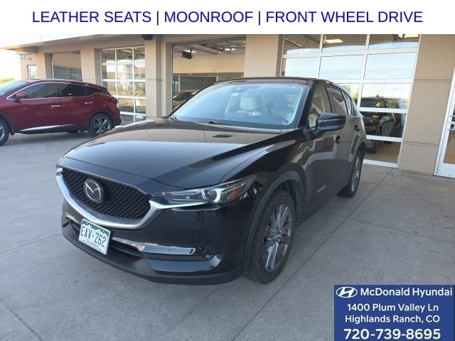 Used 2021 Black Mazda Grand Touring image 1