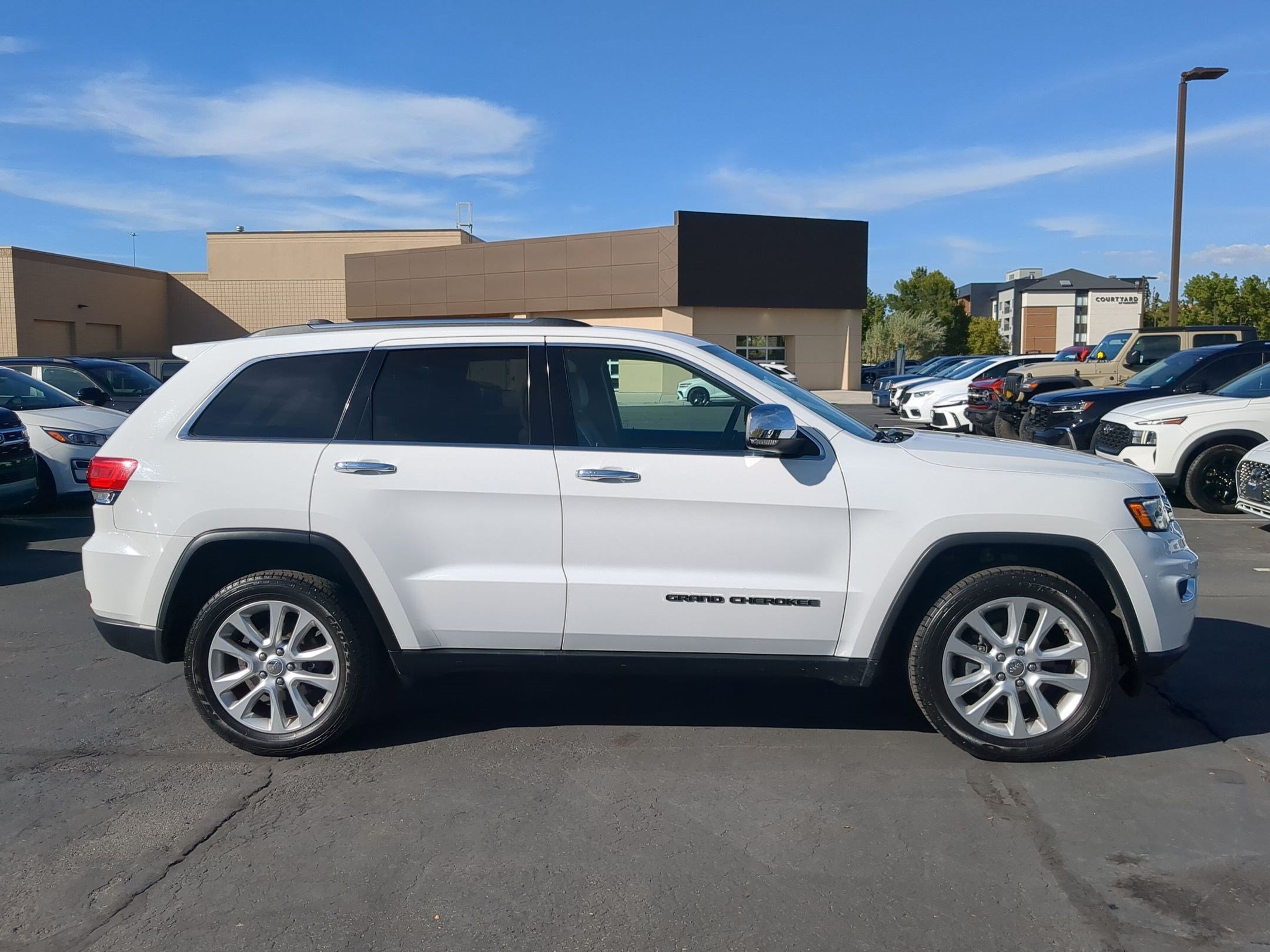 Used 2017 Bright White Clearcoat Jeep Limited image 2