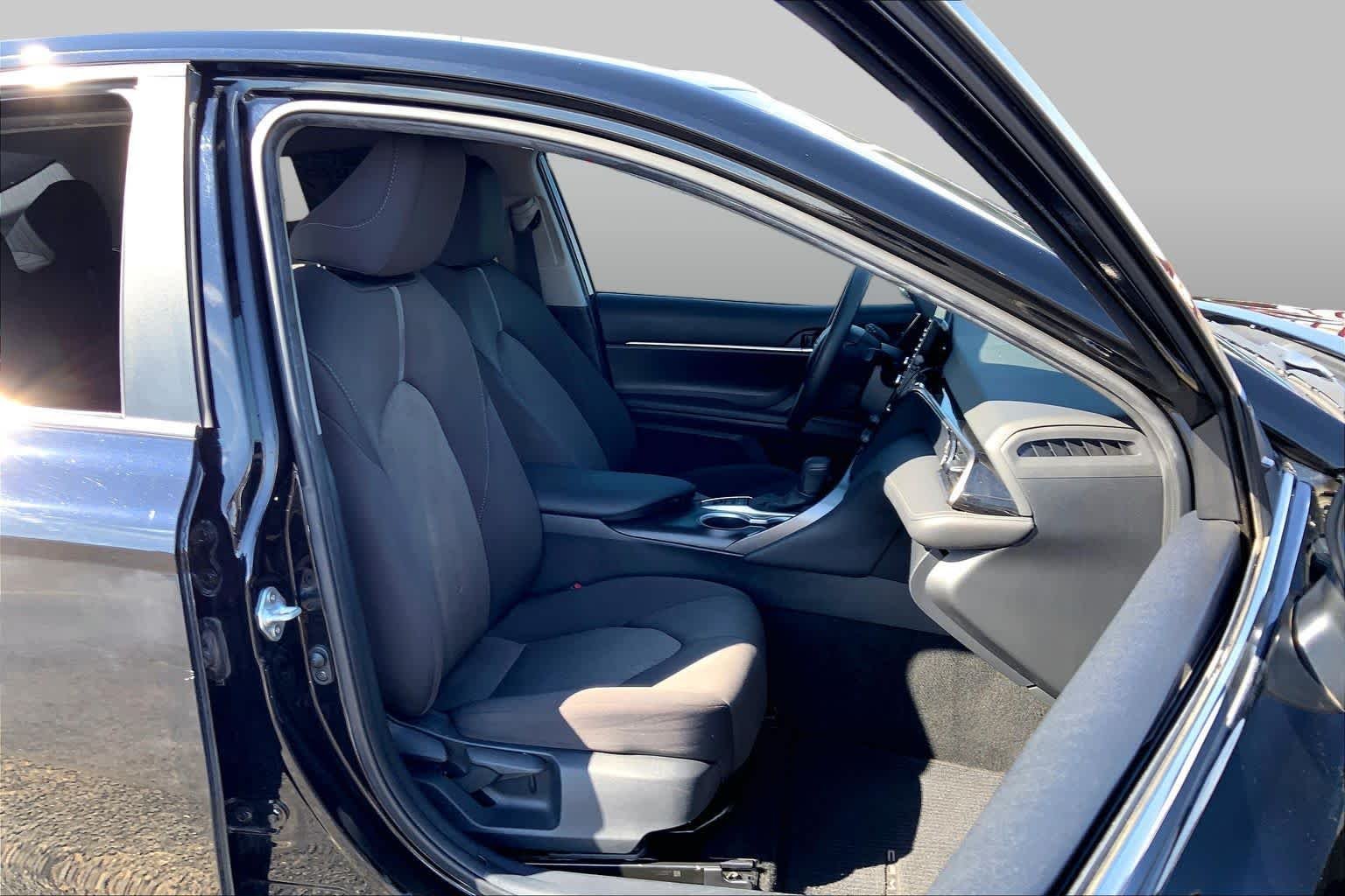 Used 2023 Midnight Black Metallic Toyota Hybrid LE image 9