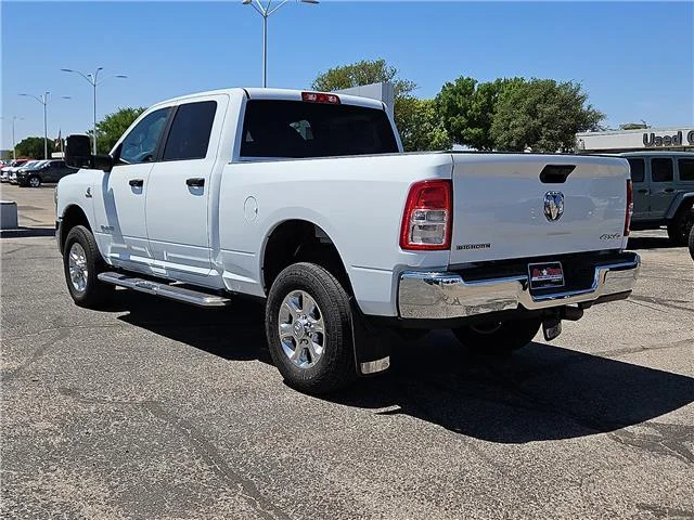 Used 2024 Bright White Clearcoat RAM Big Horn 4x4 Crew Cab 6.3 ft. box 149 in. WB image 2